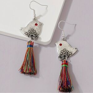 Silver bird tassel drop earrings